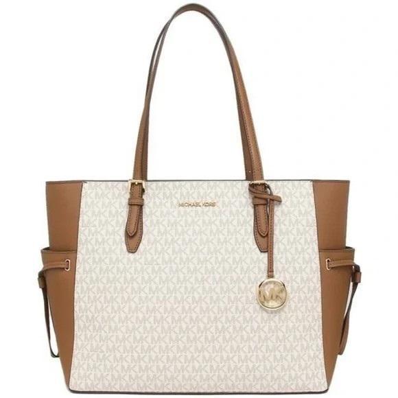 (11) Authentic Designer Handbags by Michael Kors