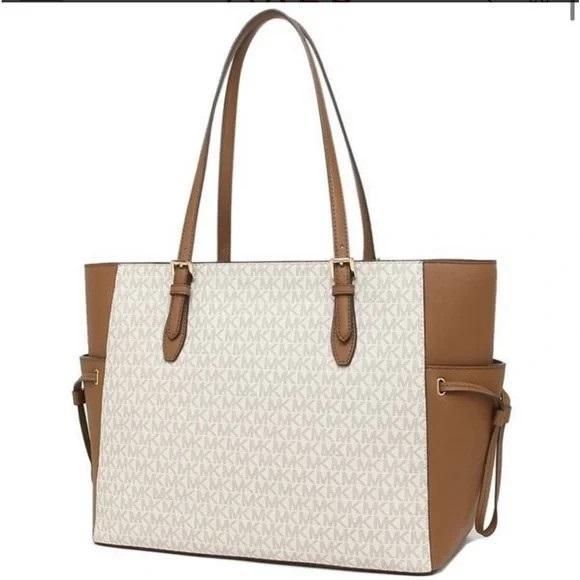 (11) Authentic Designer Handbags by Michael Kors