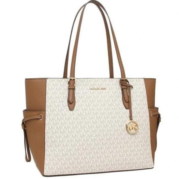 (11) Authentic Designer Handbags by Michael Kors